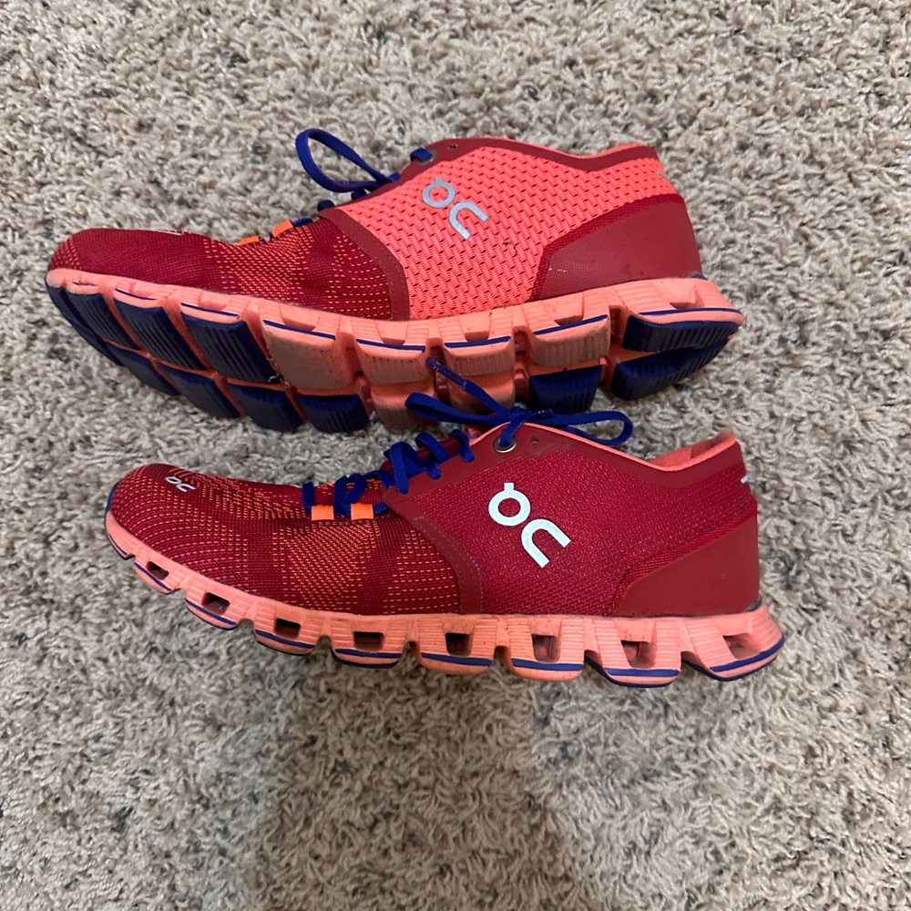 Red and orange On Cloud Cloudswift trainers